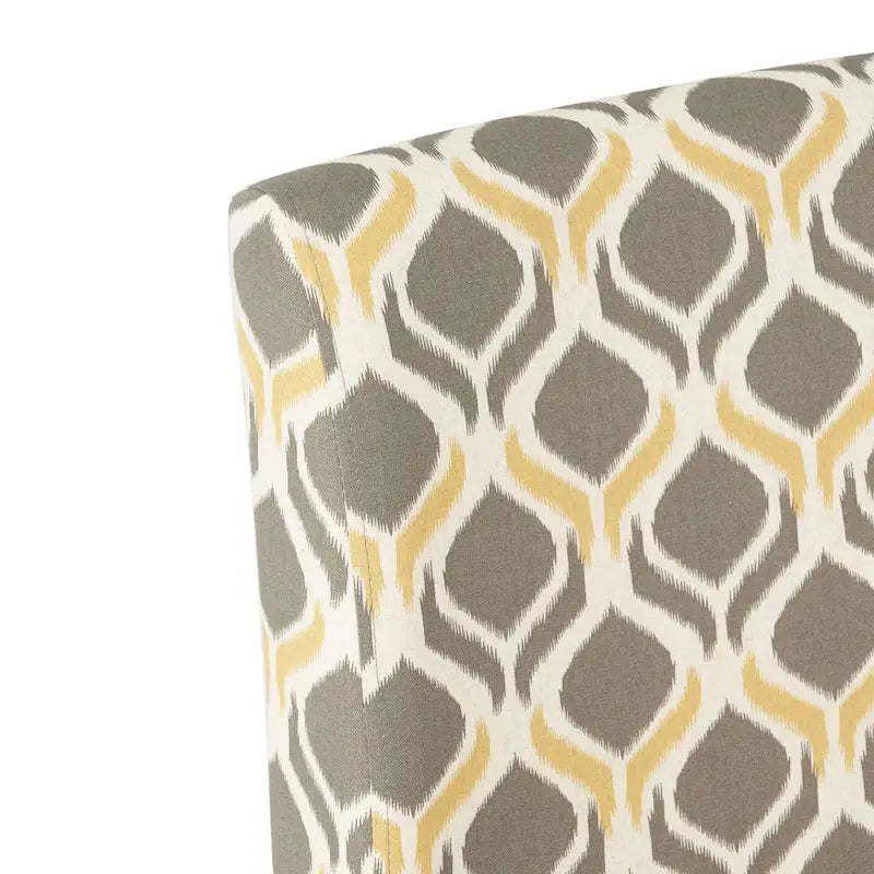 Fauteuil d'appoint crapaud capitonné bas — Tissu à motif géométrique et pieds coniques noirs mats