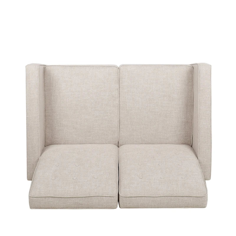 Causeuse rembourrée inclinable à dossier basculant — capitonnée, surpiqûres gaufrées et pieds en bois de hêtre